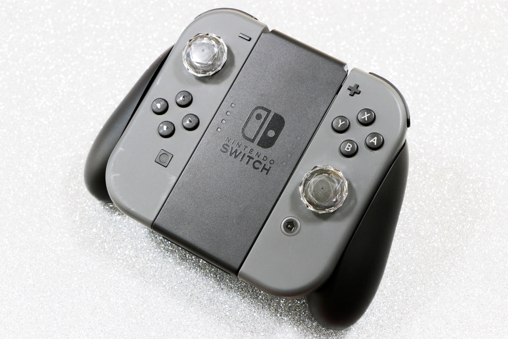 Load image into Gallery viewer, Hard Crystal Clear Thumb Grips - Nintendo Switch, Lite, OLED &amp; Switch 2 Cap Covers
